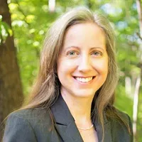 Dr. Eve Coker