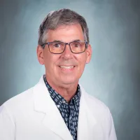 Dr. Charles M. Pesson, MD