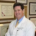 Dr Robert J. Troell, M.D., F.A.C.S.