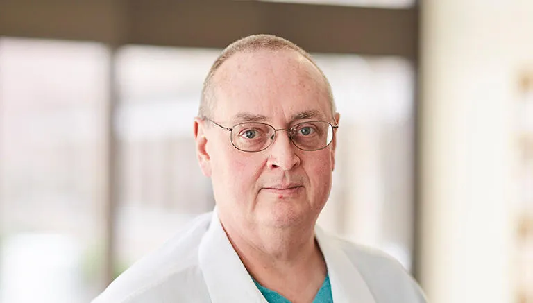 Dr. Tim E. Baker