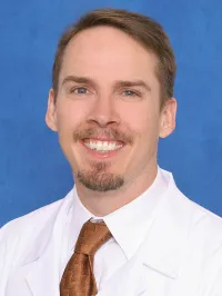 Dr. Adam Burdick, MD