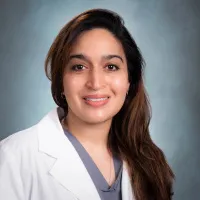 Dr. Amina Husain, MD