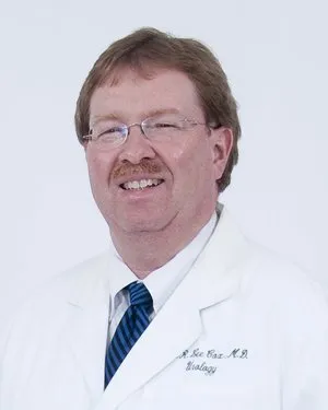 Dr. Ralph L. Cox