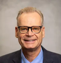 Dr. Christian Steve Breburda, MD, PhD, FACC, FASE