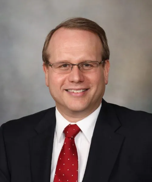 Dr. Erik K St. Louis, MD