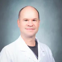 Dr. Christopher J. Karkut, MD