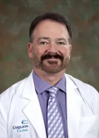 Dr. Derek R. Holmes, DO
