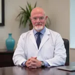 Dr. Dr. Erik Christian Petersen, DO