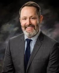 Dr. Gavin John Bush