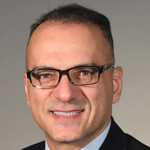Dr. John M Karamichalis, MD