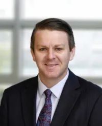 Dr. Justin Kelly, MD, FRCS, FEBS