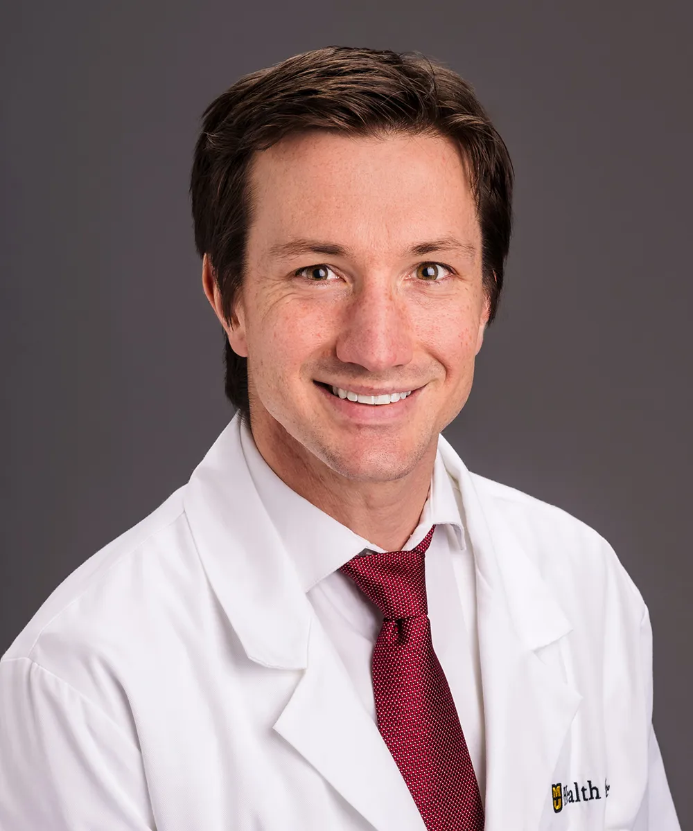Dr. Andrew J Leiker