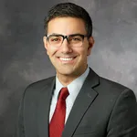 Dr. Rustin Massoudi, MD