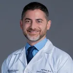 Dr. Adil A Yunis, MD