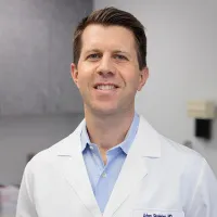 Dr. Adam Singleton, MD
