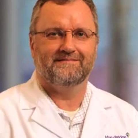 Dr. Michael James Tomkins