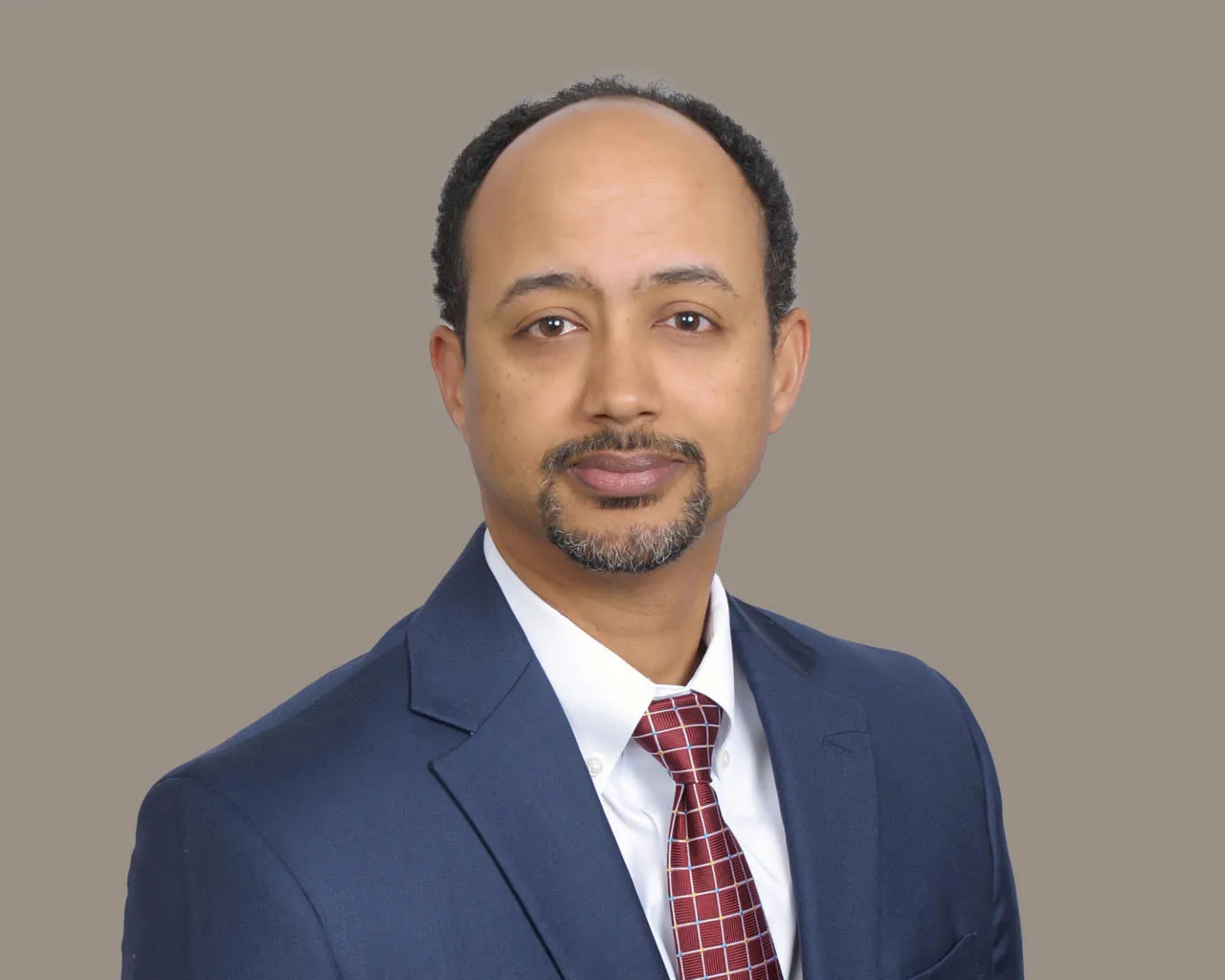 Dr. Awet Gherezghiher
