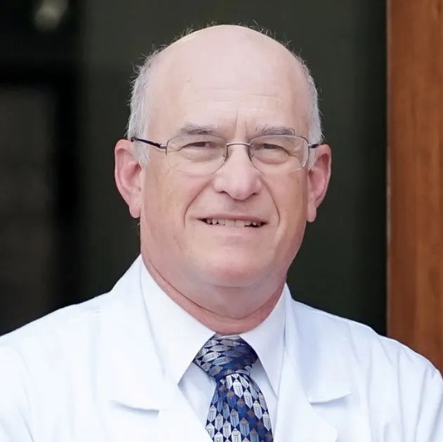 Dr. Kenneth L. Cox, DDS