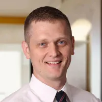 Dr. Peter C Robinson, MD