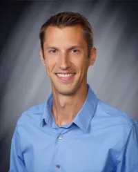 Dr. Christopher J. Richards, MD