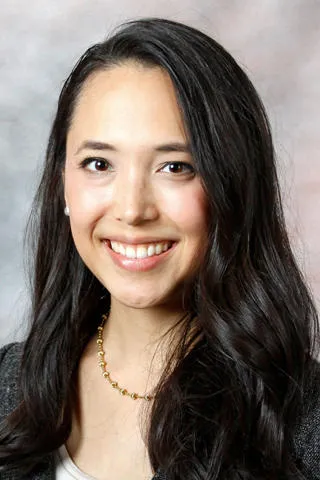 Dr. Maria Solis-Colegate, MD