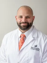 Dr. Derek E. Slack, DPM