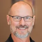 Dr. David Kinnison, DC