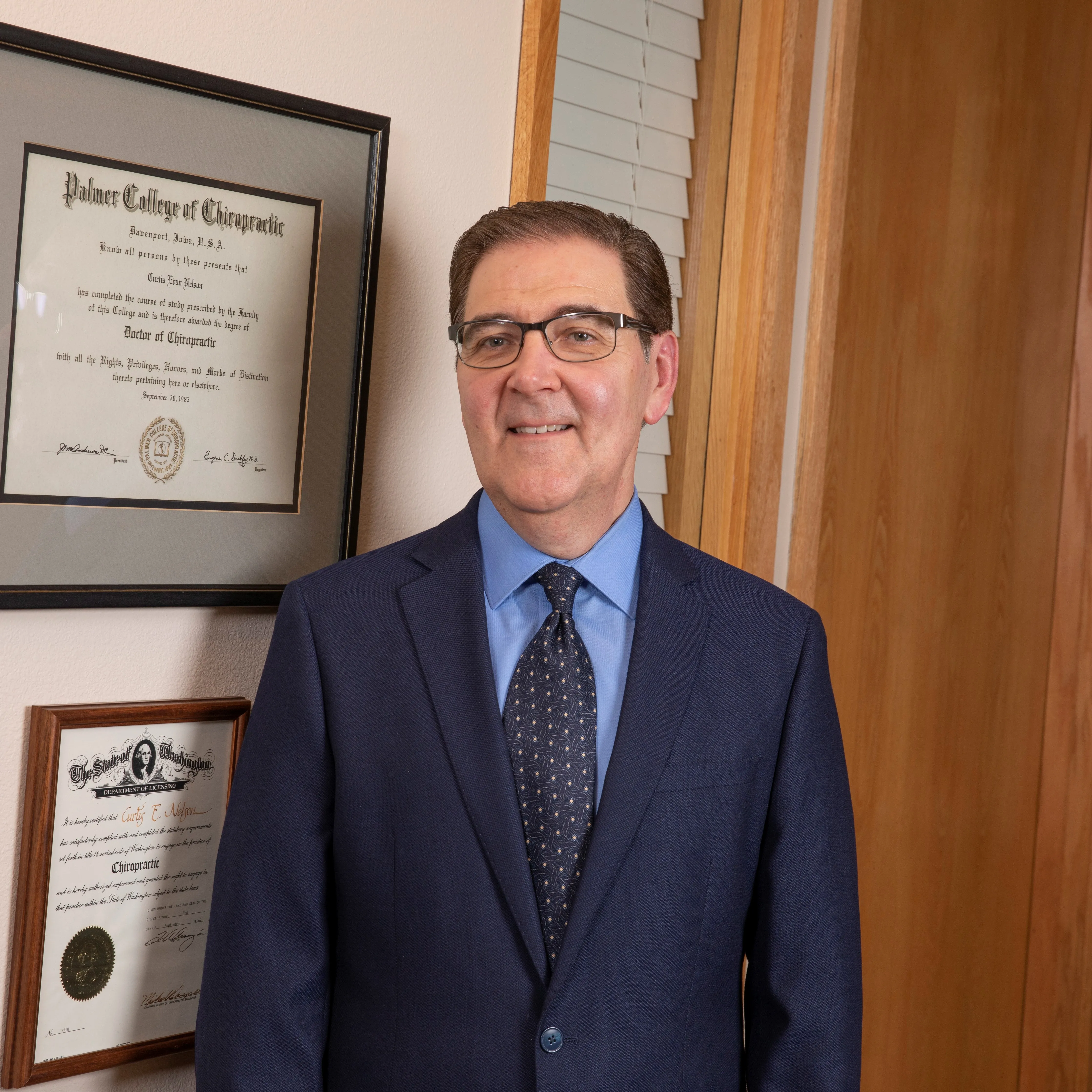 Dr. Curtis E Nelson, DC