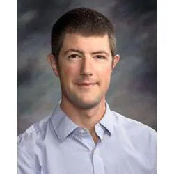 Dr. Damien C Powledge