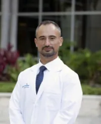 Dr. Erinc Akture, MD - Daytona Beach, FL - Neurological Surgery