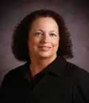 Dr. Cynthia L Saario, ,  B.S.N.