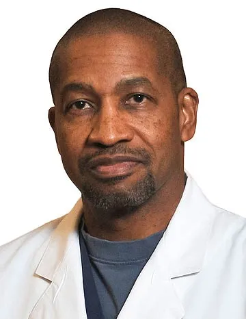 Dr. Robert J Wilcott