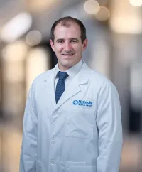 Dr. Adam Reynolds, MD