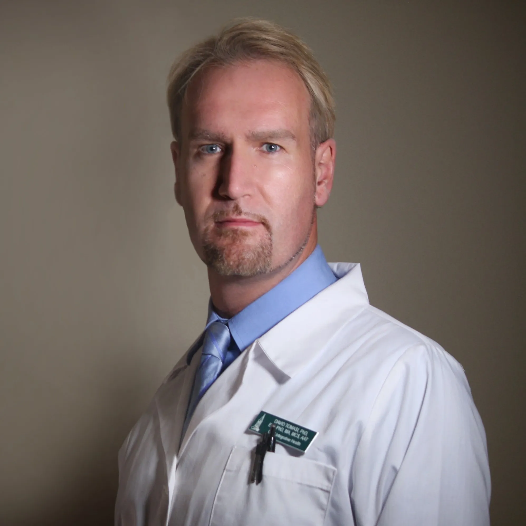 Dr. David Tomasi, DSc HC, PhD, MMed