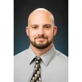 Dr. Kieran Foster Melody