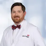 Dr. Ross D. Brockman,  MD, DMD