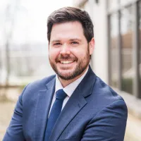 Dr. Travis Denna, MD
