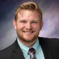 Dr. Michael C Osterholt