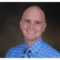 Dr. Travis Green