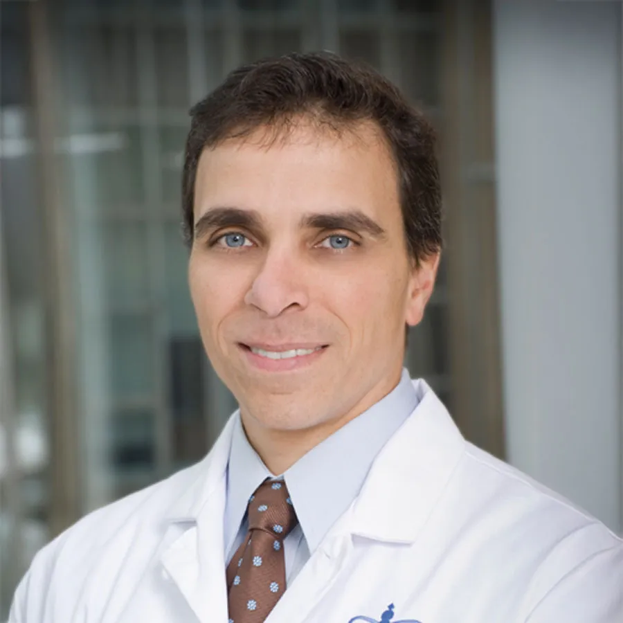 Dr. John M Poneros, MD