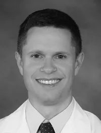 Dr. Justin P. Hollm, MD