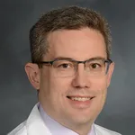 Dr. Christopher Hackett, MD, PhD