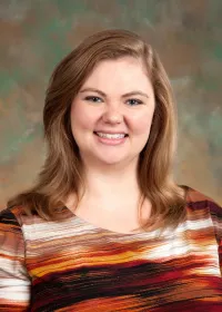 Dr. Lydia K. Higgs, CGC