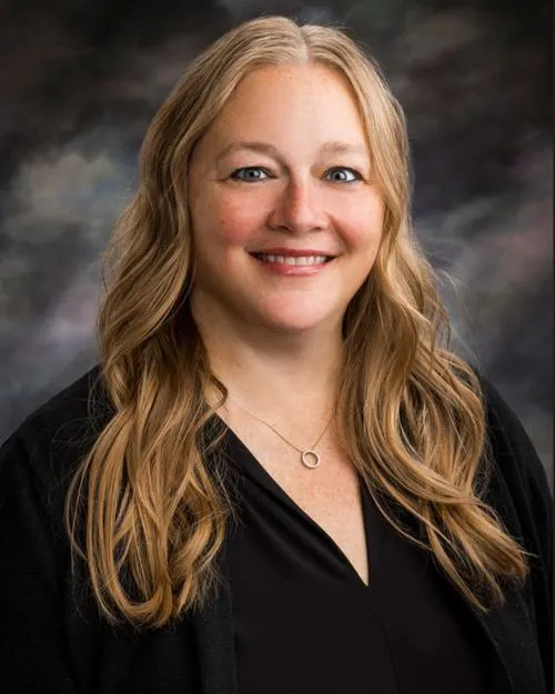 Kami M Crass, FNP, NP
