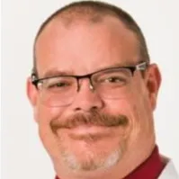 Dr. Christopher A Brewer