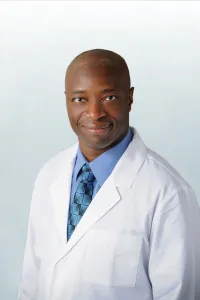 Dr. Christopher Olukoga, MD, FACS - Winter Park, FL - Surgery