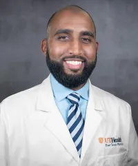 Dr. Ishaq Winters, MD