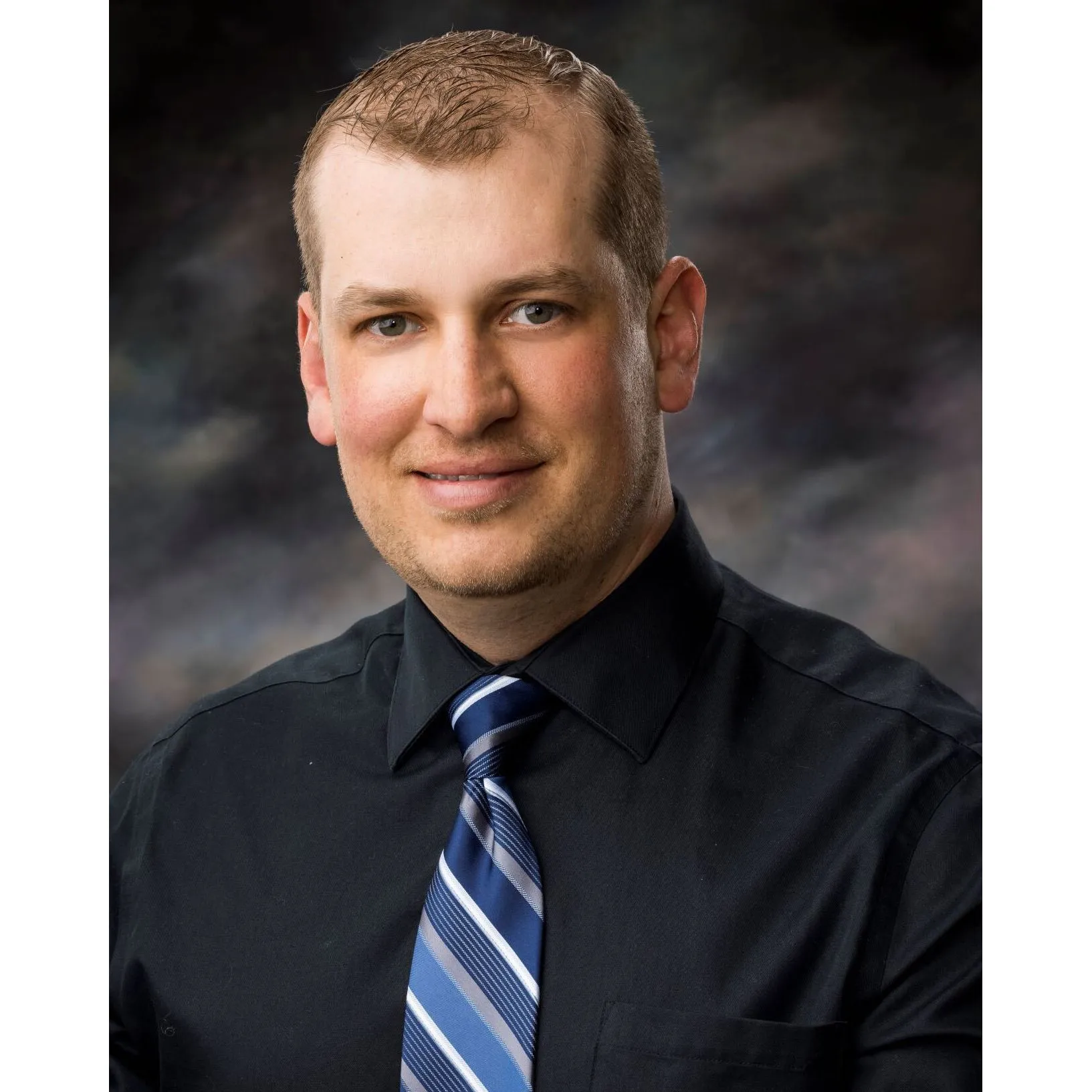 Dr. Coty J Holm