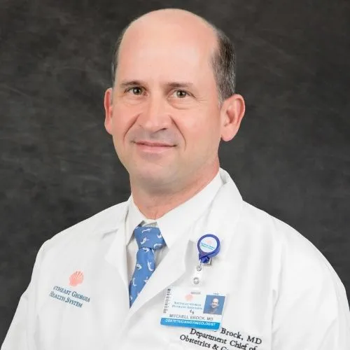 Dr. Mitchell Brock,