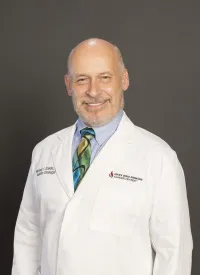 Dr. Michael Dzeda